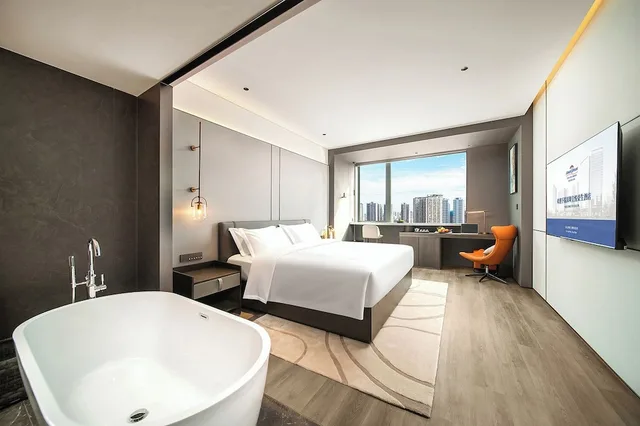 غرفة ديلوكس بسرير كينج، Howard Johnson Royal Hotel Shenzhen 2/2