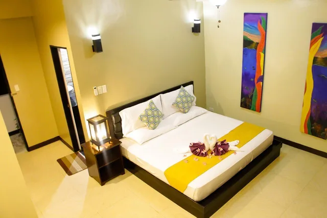 جناح ديلوكس بسرير كينج بإطلالة على البحر، Sulusea Boutique Hotel 2/2