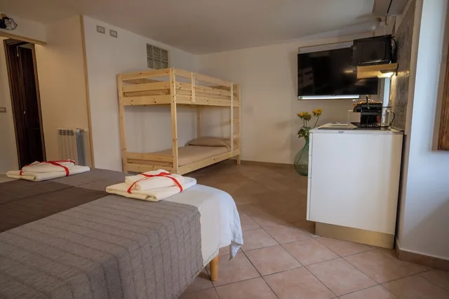 استوديو بسرير كوين بشرفة، B&amp;B La Suite 7/8