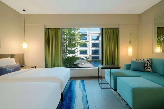 غرفة بسريرين منفصلين بإطلالة على المسبح مع أريكة، Hyatt Centric Candolim Goa 2/10