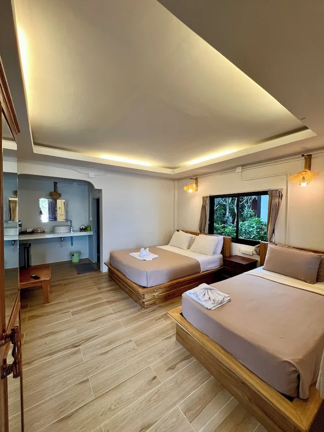 بنغل كومفورت بسرير مزدوج وسرير فردي بإطلالة على الشاطئ، Pen S Bungalow 1/4