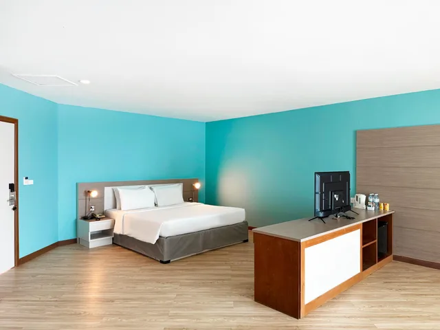 غرفة عائلية بسرير كينج وسرير بطابقين بإطلالة على الحديقة، Pinnacle Grand Jomtien Resort 1/2