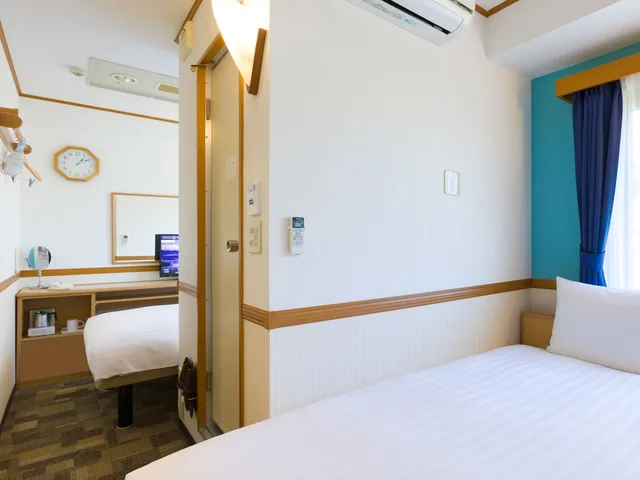 غرفة بسريرين منفصلين، TOYOKO INN YOKOHAMA STADIUM-MAE NO.1 1/4