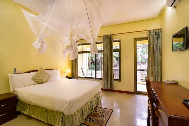 غرفة قياسية بسرير كينج بشرفة، Mvuli Hotel 4/9