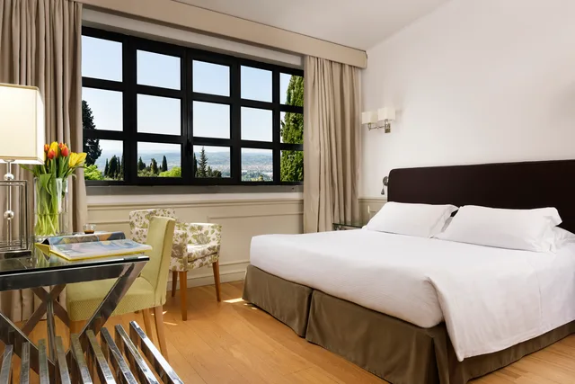 غرفة ديلوكس مفردة بسرير كوين، Villa Fiesole 1/4