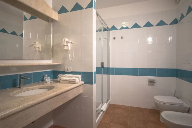 شقة أساسية بسرير كوين وسريرين منفصلين، Le Residenze del Golfo di Orosei 3/3