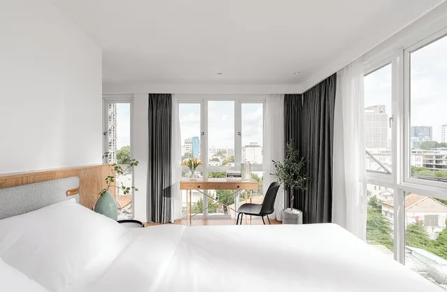 جناح دوبلكس عائلي بسريرين كوين، M Village Hotel Hai Ba Trung, a brand of Modern Village Lifestyle 1/3