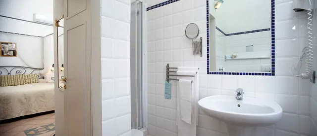 غرفة كلاسيكية ثلاثية بسرير كوين وسرير فردي، Hotel Del Borgo 5/5