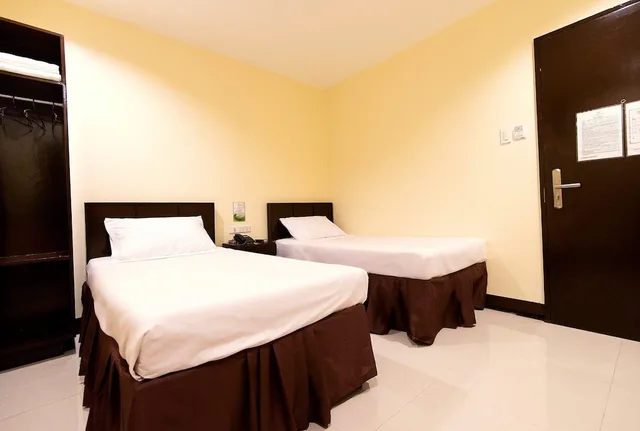 غرفة قياسية بسريرين منفصلين، Winzelle Suites 1/1