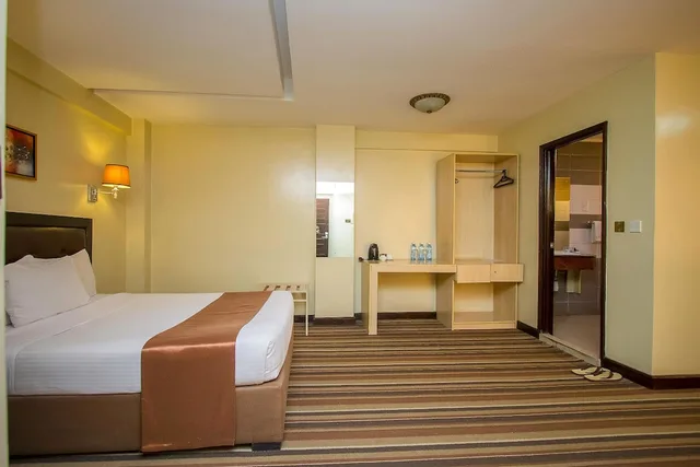 غرفة ديلوكس بسرير كوين، The Clarion Hotel Nairobi 1/10