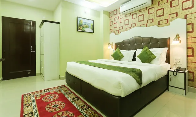 غرفة بريميوم بسرير كوين وسريرين منفصلين، Treebo Roshan House 10/10