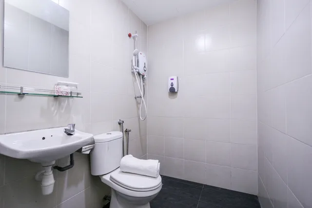 غرفة قياسية مزدوجة، Capital O 90545 Ho Hotel 3/3