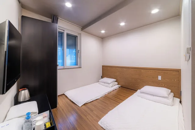 غرفة ديلوكس بفرشتي فوتون، Soo Song Guest House 6/10