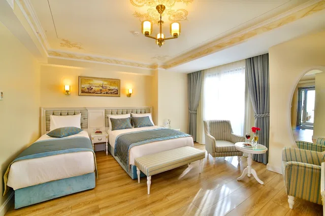 غرفة ديلوكس ثلاثية بسرير مزدوج وسرير فردي بغرفة نوم واحدة، Yilsam Sultanahmet Hotel 1/2