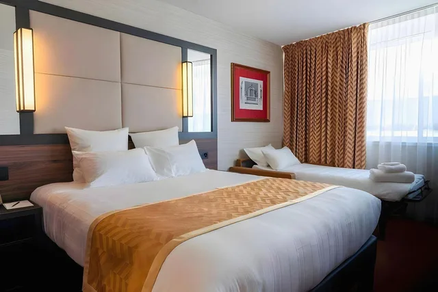 جناح سوبيريور ثلاثي بسرير مزدوج مع أريكة، Nash Suites Hotel 1/1