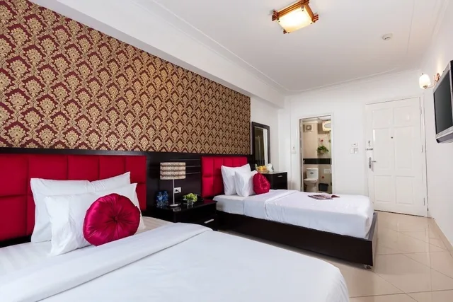 غرفة ديلوكس بسريرين منفصلين بإطلالة على المدينة، Amore Hotel 1/3