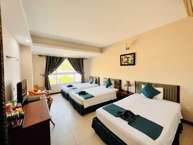 غرفة ديلوكس ثلاثية بثلاثة أسرّة بإطلالة على الجبل، The Coast Hotel 1/3