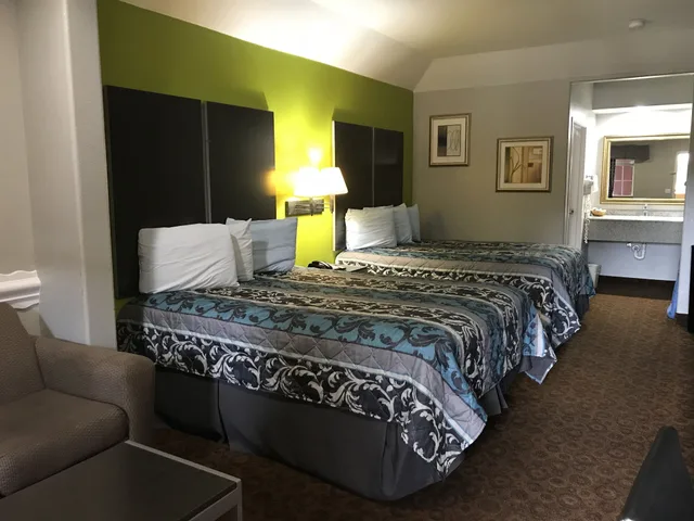 Deluxe, 2 Double Beds, Smoking, Camelot Inn Suites Veterans Memorial/Nw Houston 2/4
