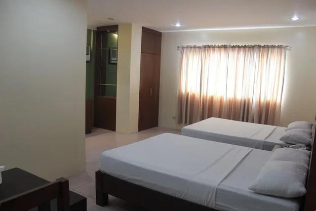 غرفة عائلية بسريرين كوين، Joyce Apartelle Kalentong 1/6