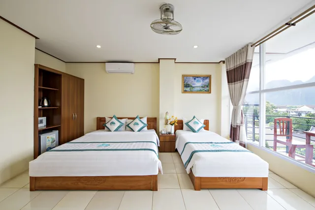 Deluxe, Family, 1 Queen and 1 Single Bed, No Balcony، Annecy Hotel Vang Vieng 2/4