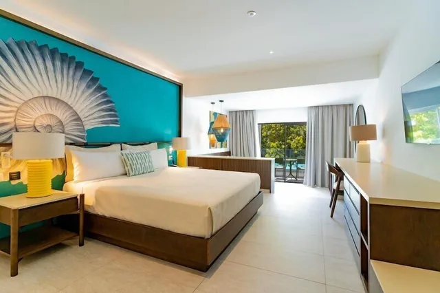 غرفة غراند بسريرين مزدوجين، Caribe Deluxe Princess 1/10