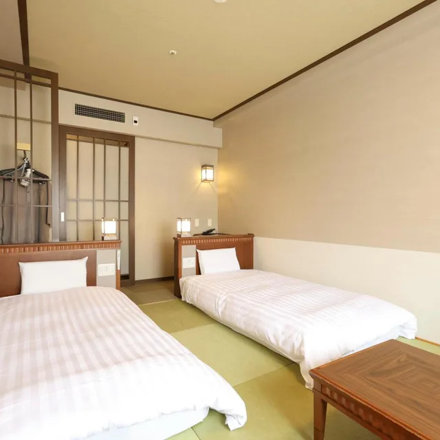 غرفة بسريرين منفصلين بأرضية تاتامي، Dormy Inn Premium Otaru 1/7