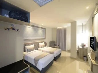 غرفة غراند ديلوكس بسريرين منفصلين، Savero Style Hotel Bogor 1/1