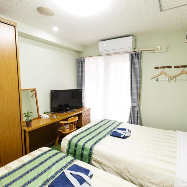 غرفة بسريرين منفصلين، Hotel Peaceland Kume 3/10