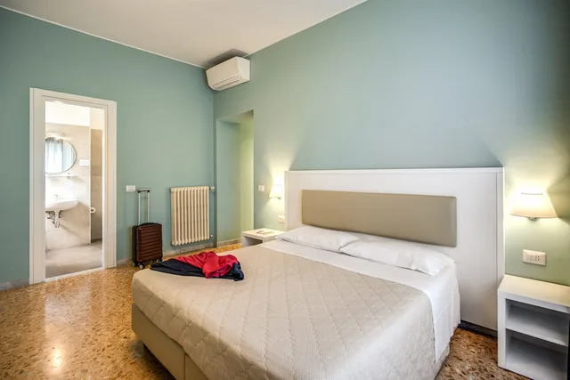 غرفة ديلوكس ثلاثية بسرير مزدوج وسرير فردي، Casa Ravasco 2/5