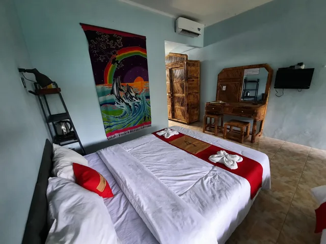 غرفة ديلوكس بسرير كوين بإطلالة على المسبح، Hotel Pesona Bulan Baru Senggigi 4/5