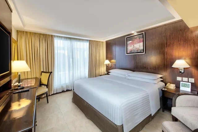 جناح تنفيذي تنفيذي بسرير كينج مع دخول الصالة، ISLAMABAD MARRIOTT HOTEL 5/10