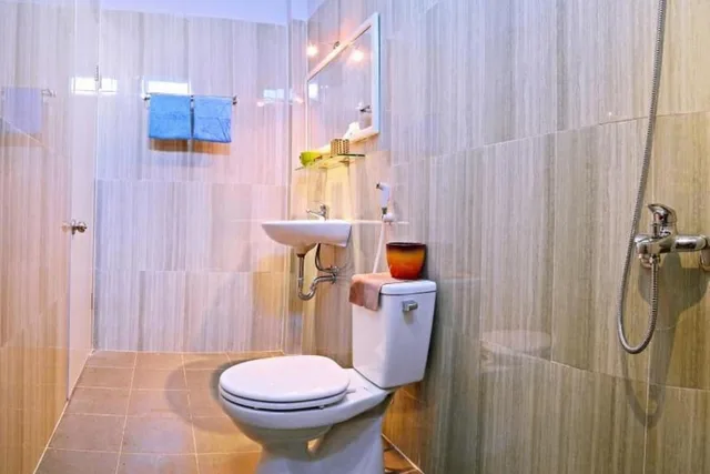 غرفة عائلية بسرير كوين وسرير فردي بإطلالة على الحديقة بشرفة، Green Garden Homestay 6/6