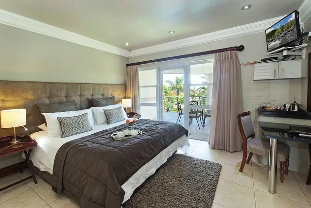 جناح تنفيذي بسرير كينج، Ushaka Manor Guest House 1/3