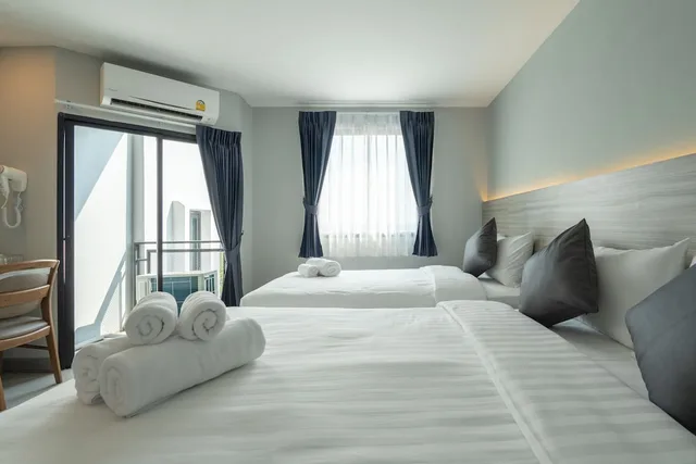 غرفة ديلوكس ثلاثية بسرير كوين وسرير فردي، Cozy Blu Suvarnabhumi 1/3