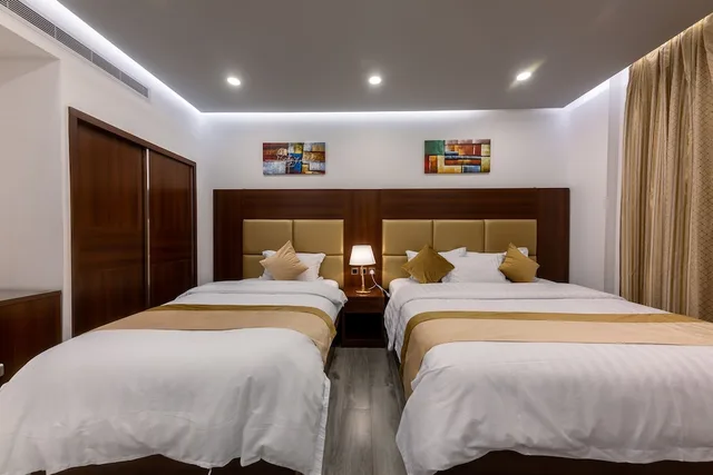 غرفة قياسية ثلاثية بسرير مزدوج وسرير فردي، فندق روزالينا(Rosalina Hotel) 1/6