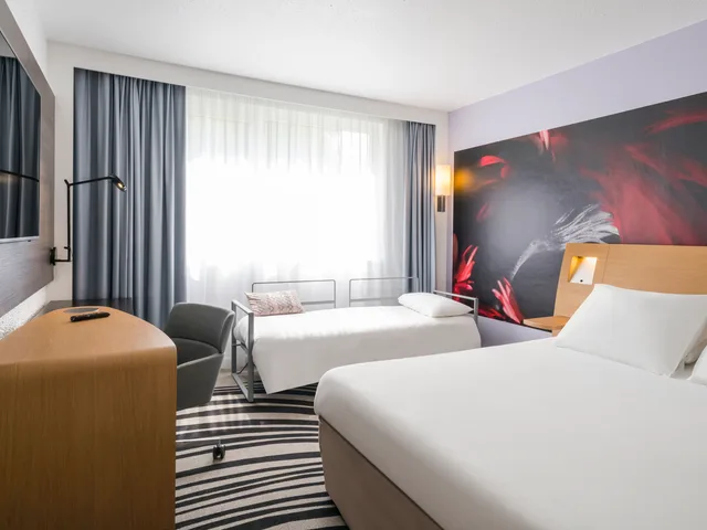 غرفة كلاسيكية بسرير مزدوج مع أريكة، Novotel Paris Saclay 1/2