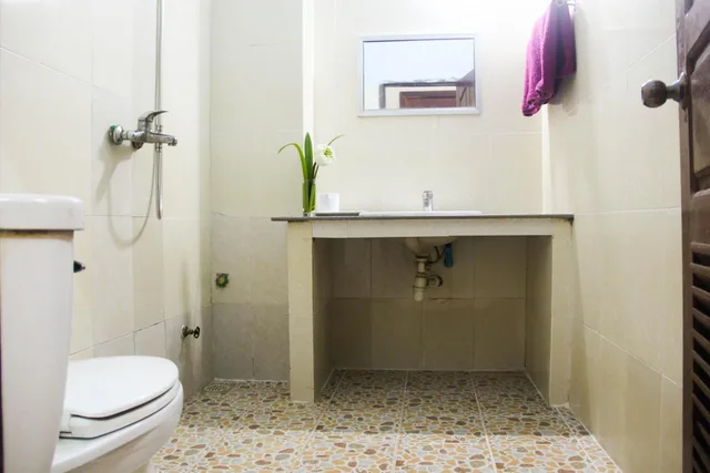 غرفة عائلية، Tropical Breeze Guesthouse 4/4