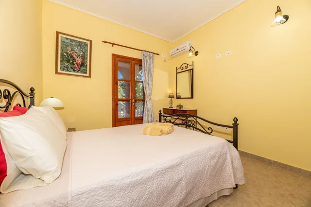 شقة بسريرين مزدوجين بغرفتي نوم مع أريكة في الطابق الأرضي، Arazzo Holiday Apartments 1/8