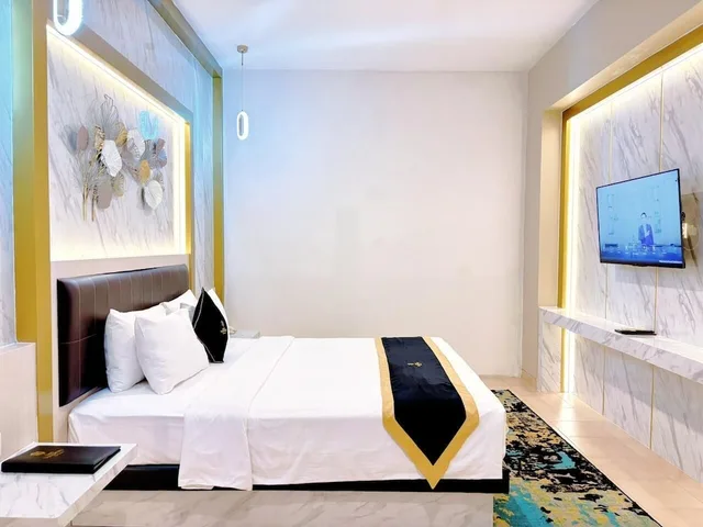 غرفة تنفيذية بسرير كينج، Grand Malioboro Yogyakarta Hotel 2/5