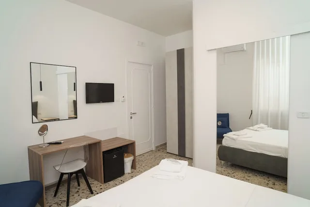 غرفة كومفورت ثلاثية بسرير كوين وسرير فردي في الطابق الأرضي، B&B Il Geranio 8/10