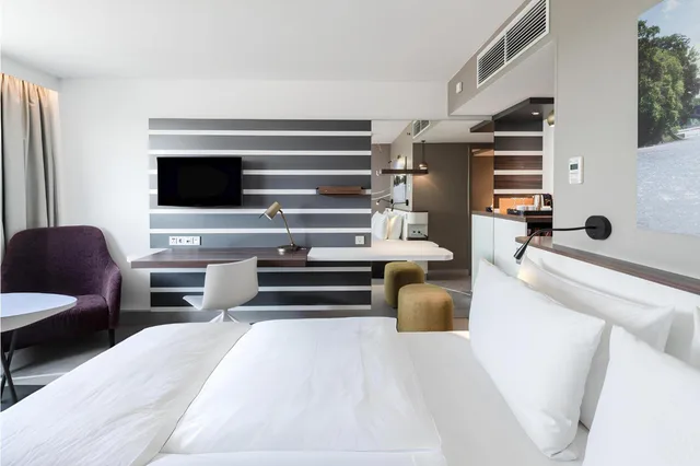 غرفة بريميوم بسرير كينج وسرير كوين بإطلالة على المدينة، Holiday Inn Munich - City Centre 2/8