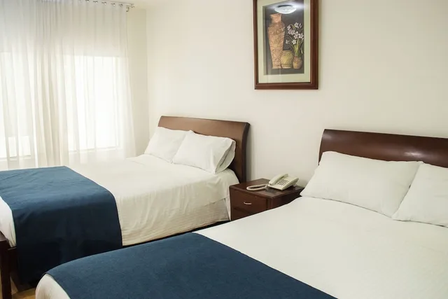 Room, 2 Queen Beds, Nogal Suite Hotel Pasto 6/8