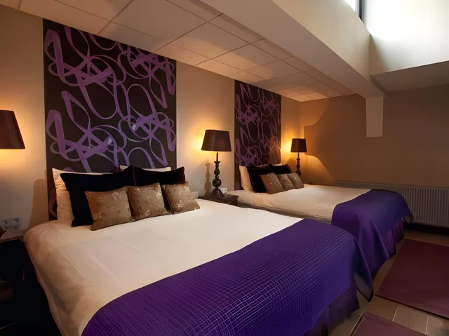 غرفة فاخرة عائلية بسريرين كوين، HAMPSHIRE BOUTIQUE HOTEL SEBASTIANS 1/2
