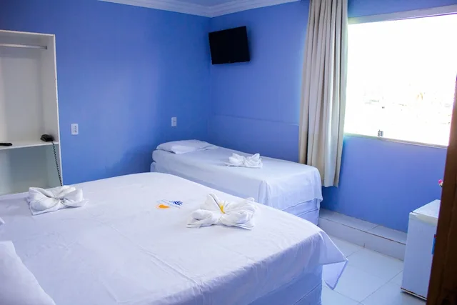 غرفة ثلاثية بسرير كوين وسرير فردي بإطلالة على البحر، Hotel Luar De Itapua 7/10