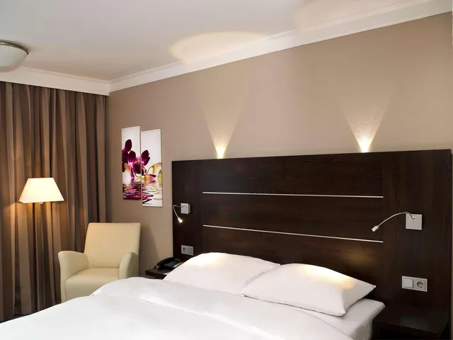 جناح بسرير فردي بمنطقة جلوس، MERCURE HOTEL HAMM 2/5