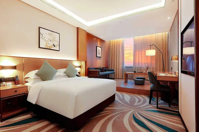 غرفة ديلوكس بسرير كينج للمدخنين، Ramada by Wyndham Leshan 3/10
