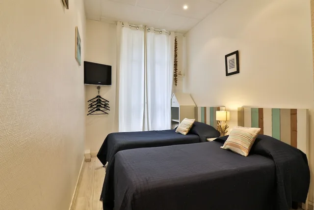 كابينة صغيرة بسريرين منفصلين، Hotel Victor Hugo 3/4