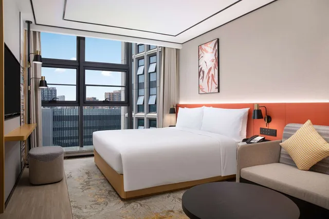 غرفة ديلوكس بسرير كينج مع أريكة، Hilton Garden Inn Beijing Huaxiang Tiantan Hospital 1/3