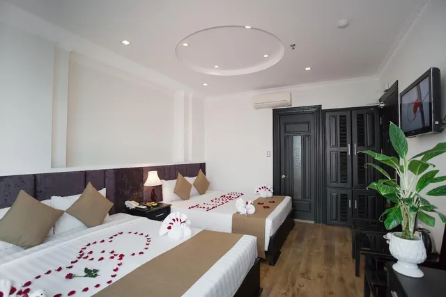 غرفة أساسية رباعية بسرير كوين وسرير فردي، Adina Hotel 1/2