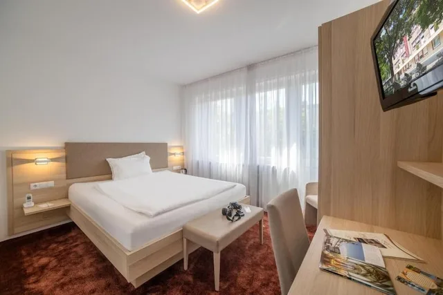 غرفة قياسية بإطلالة على المدينة مفردة بسرير فردي، Hotel Brenner 1/2